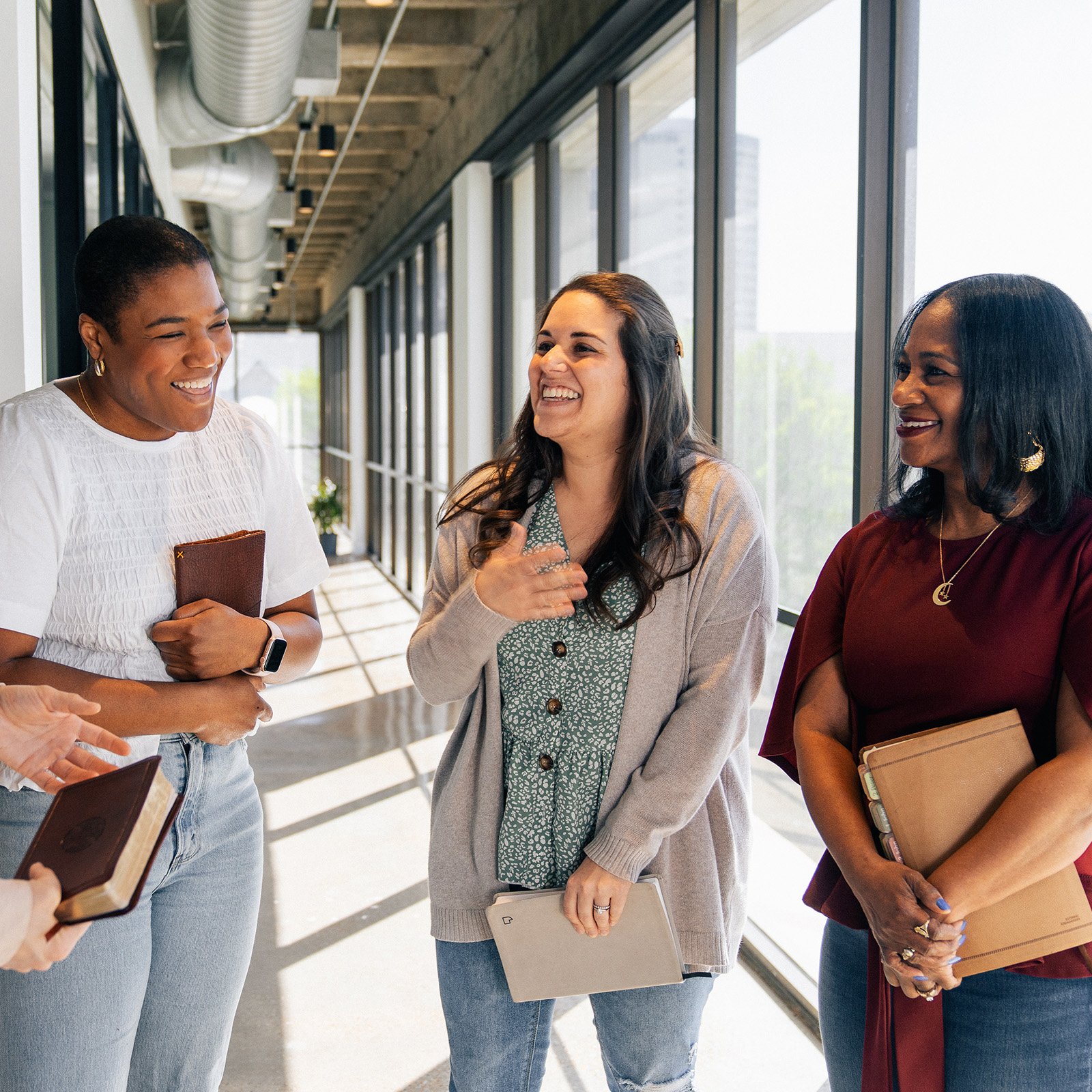 Watermark staff women talking together