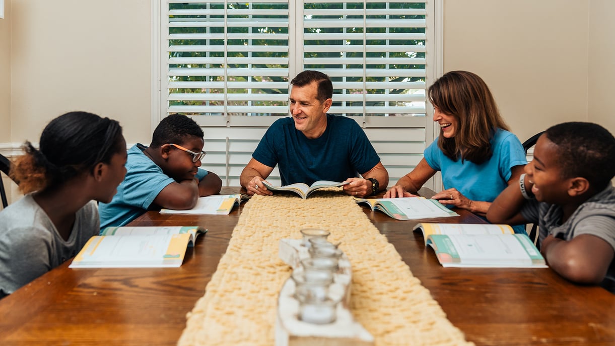 A family sits around a table