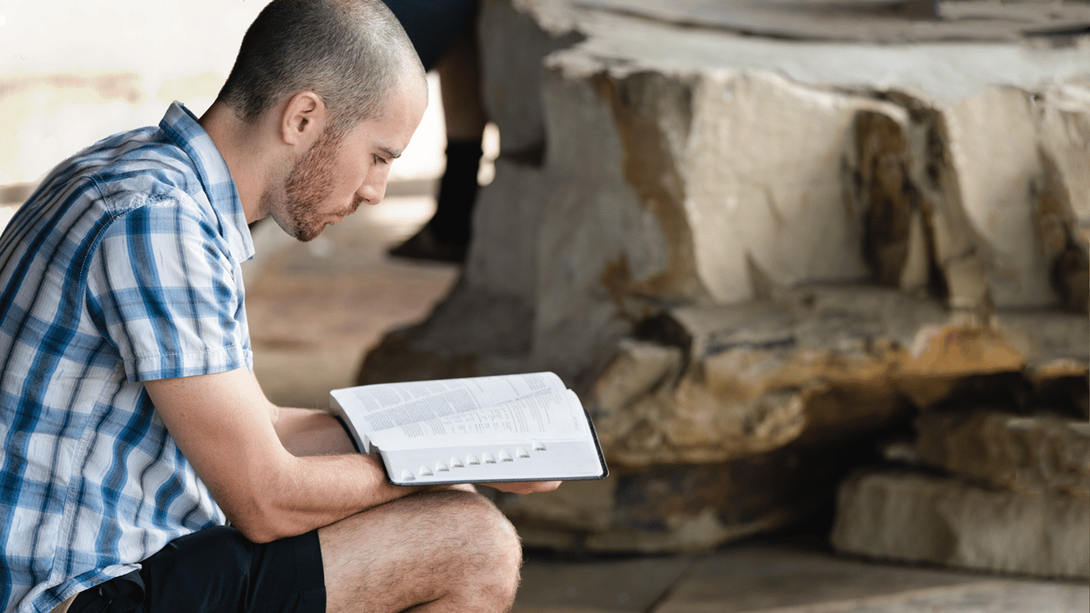A man reading his bible