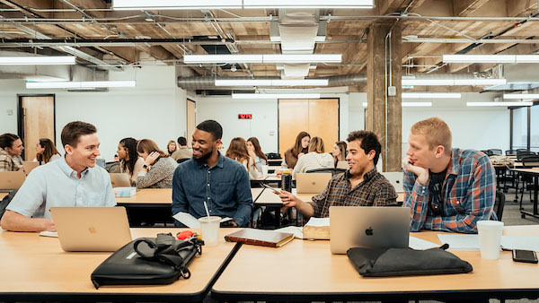 Watermark Residents talking in class together