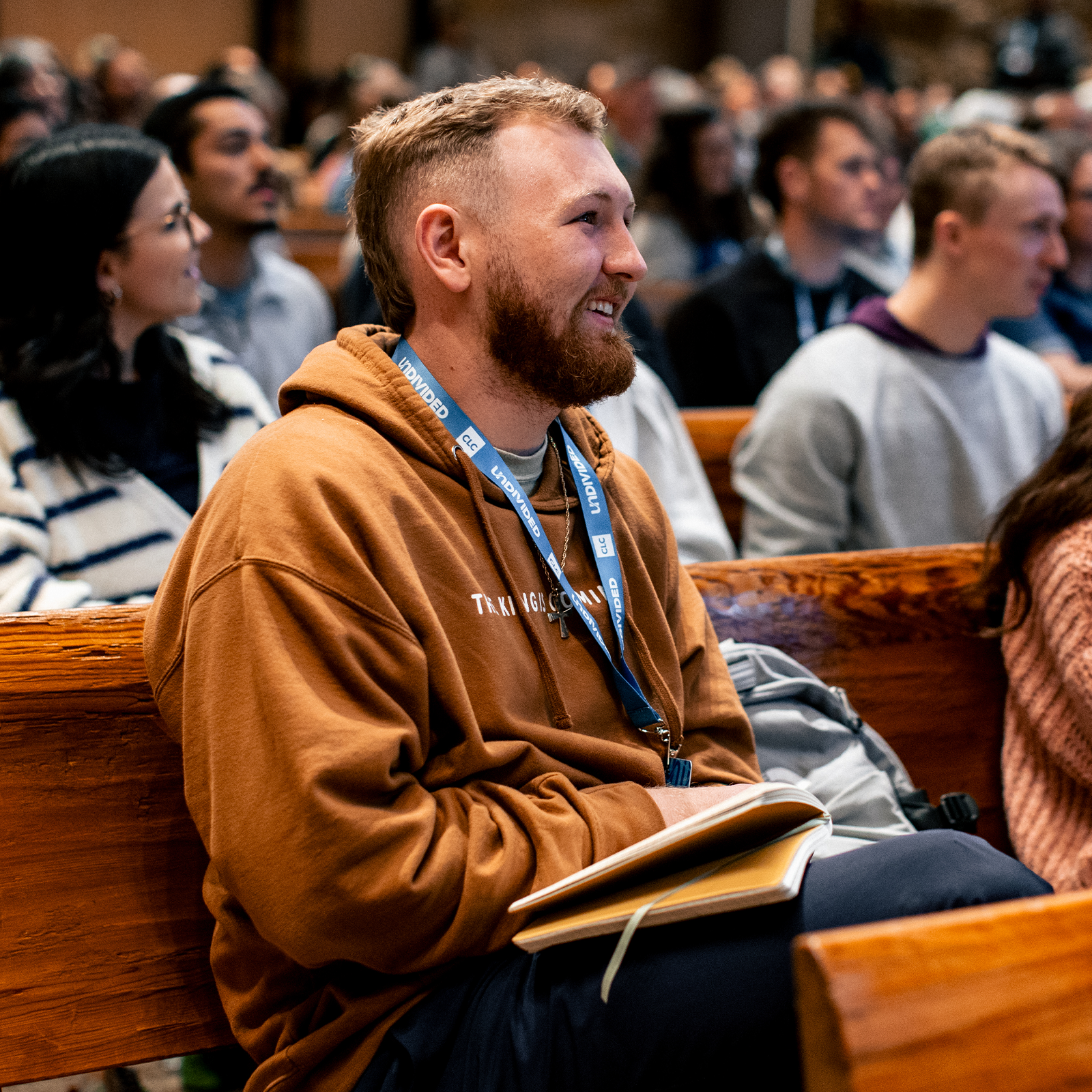 Church leader listening to a breakout session at CLC