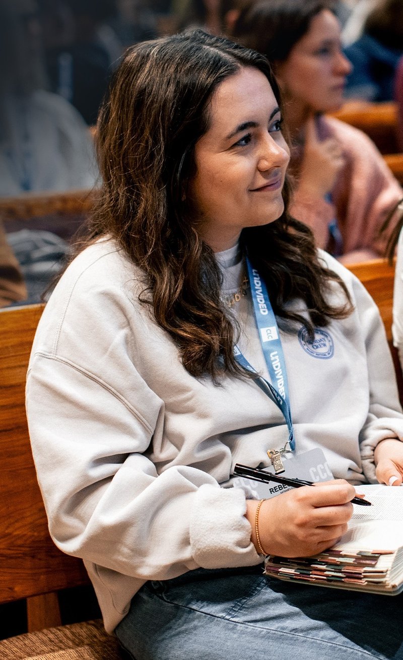 Young woman sitting at CLC conference