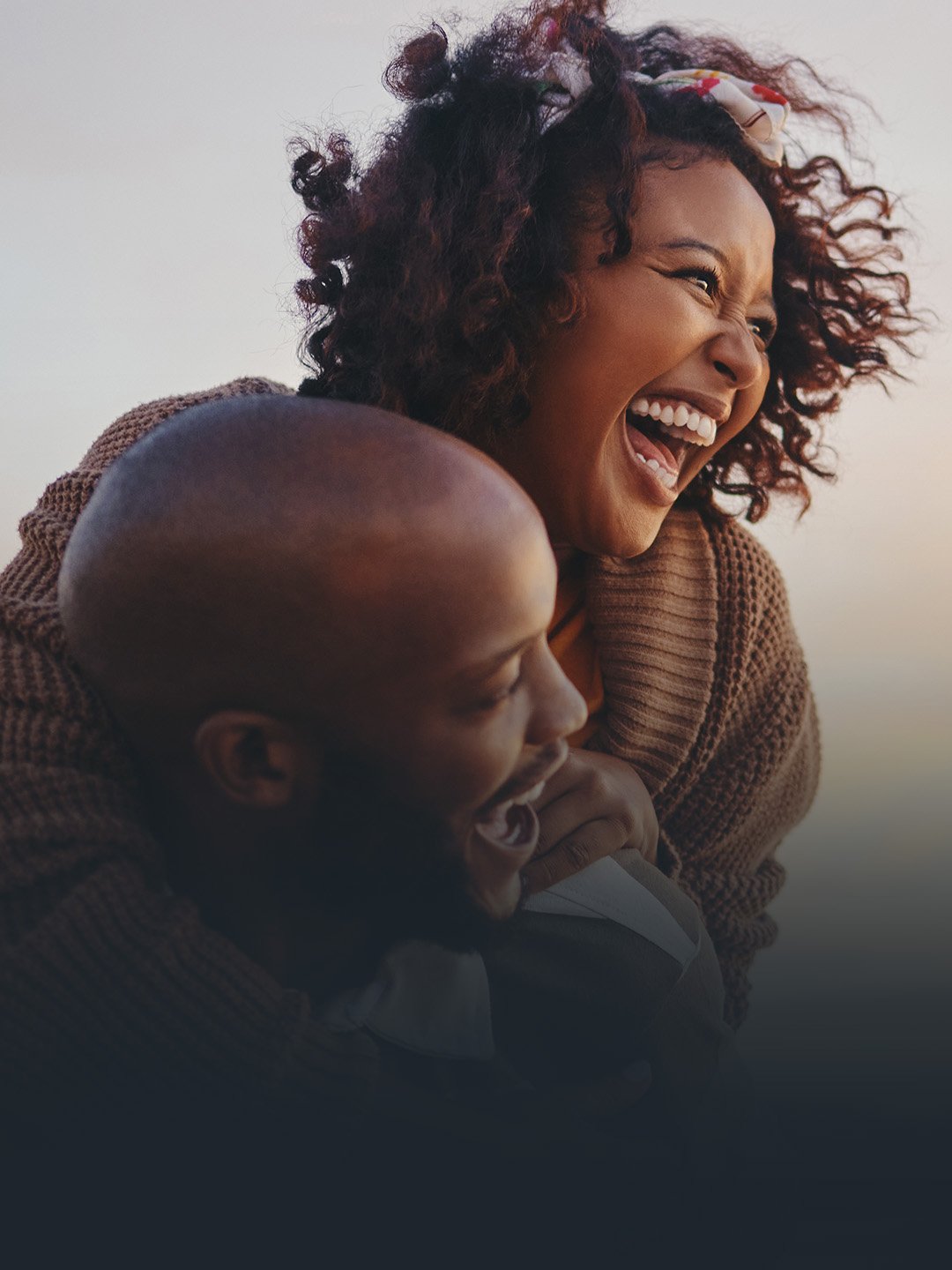 A Foundation Group couple smiling in a photoshoot
