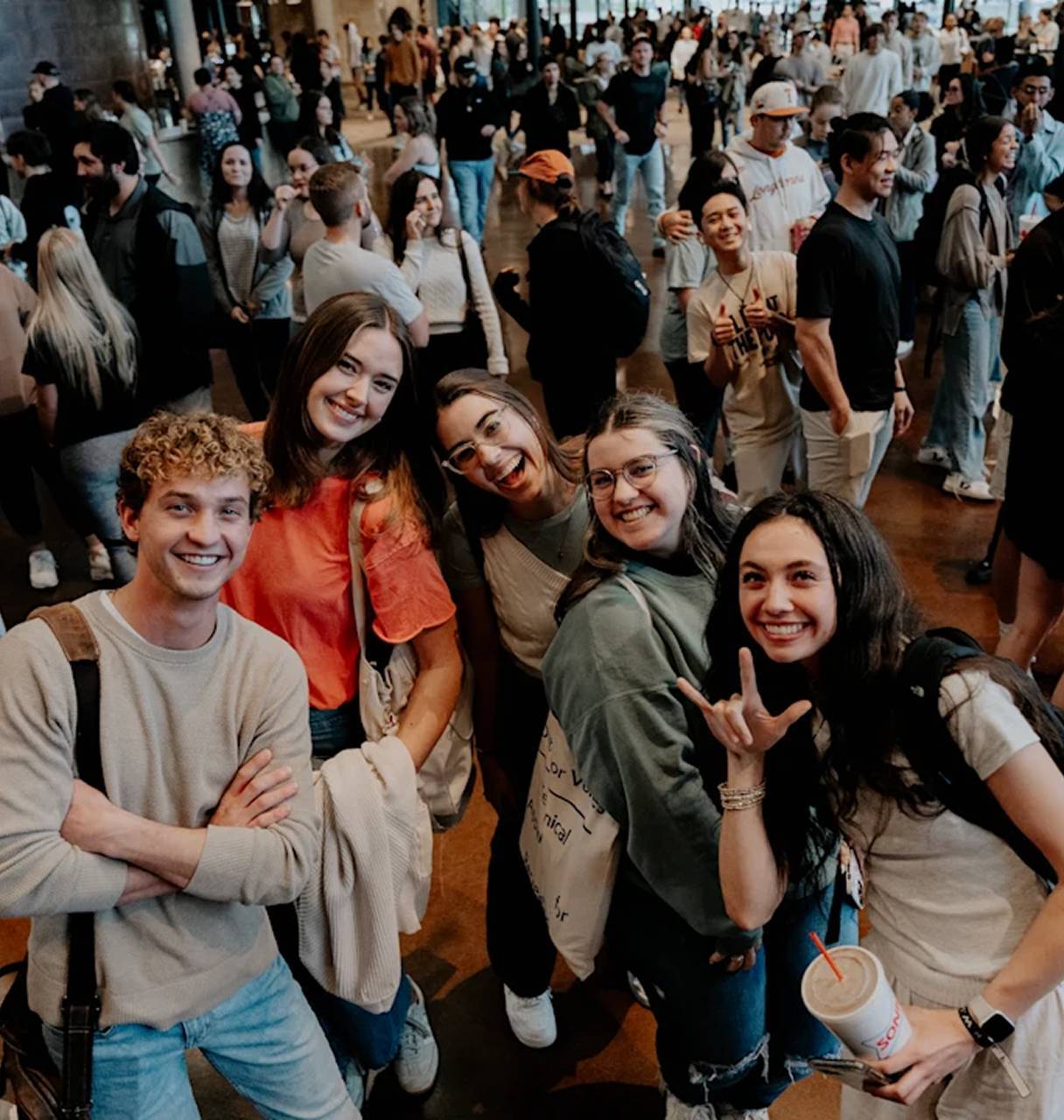Young adults smiling together at The Porch in Dallas, TX