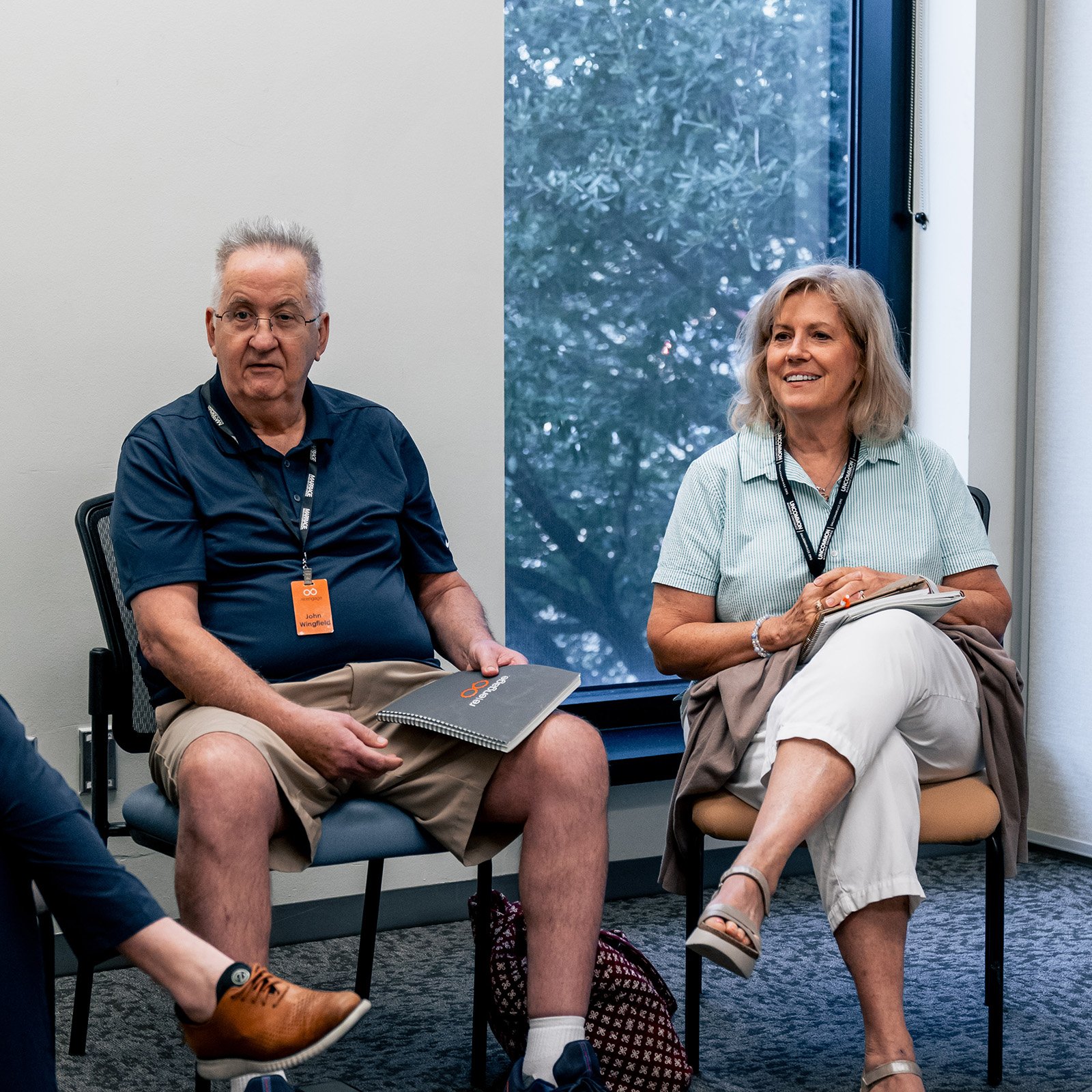 A Re|engage leader couple sharing in small group time