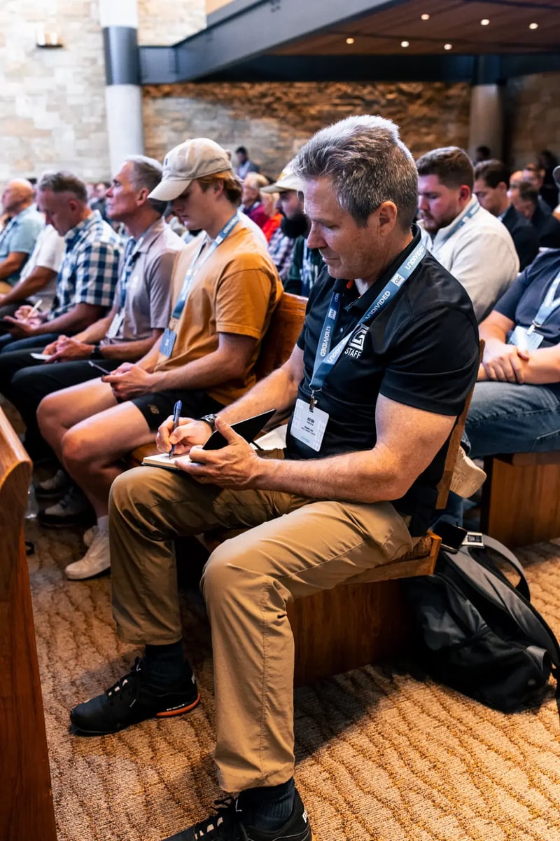 CLC attendee taking notes at Watermark Community Church