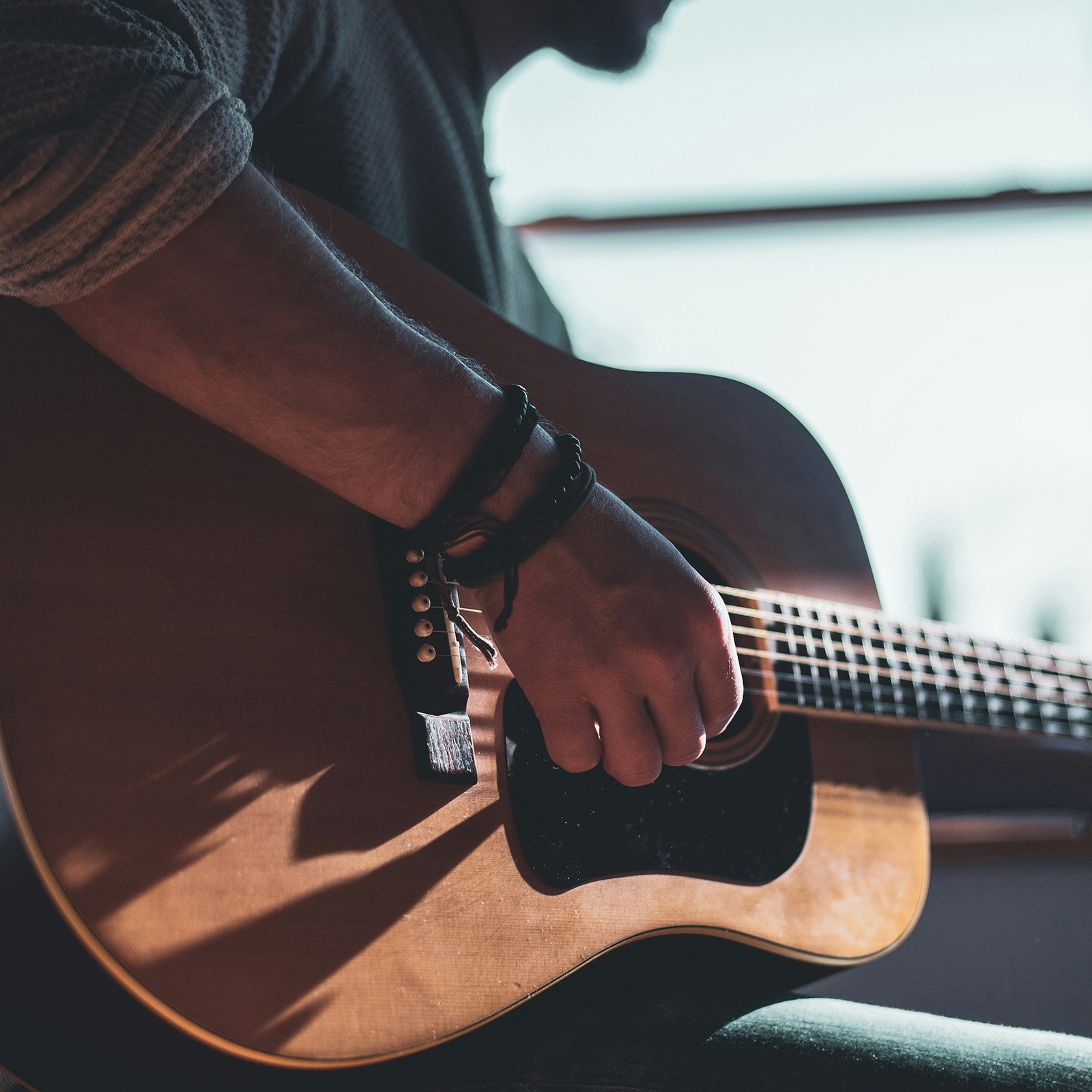 Worship leader playing the guitar