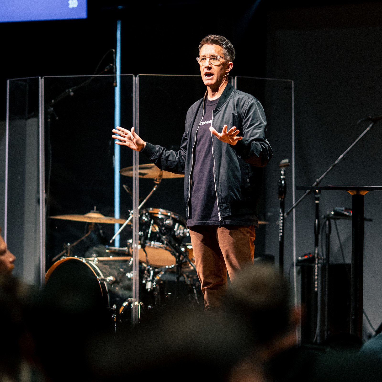 David Penuel, Associate Pastor at Watermark Community Church, teaching from stage