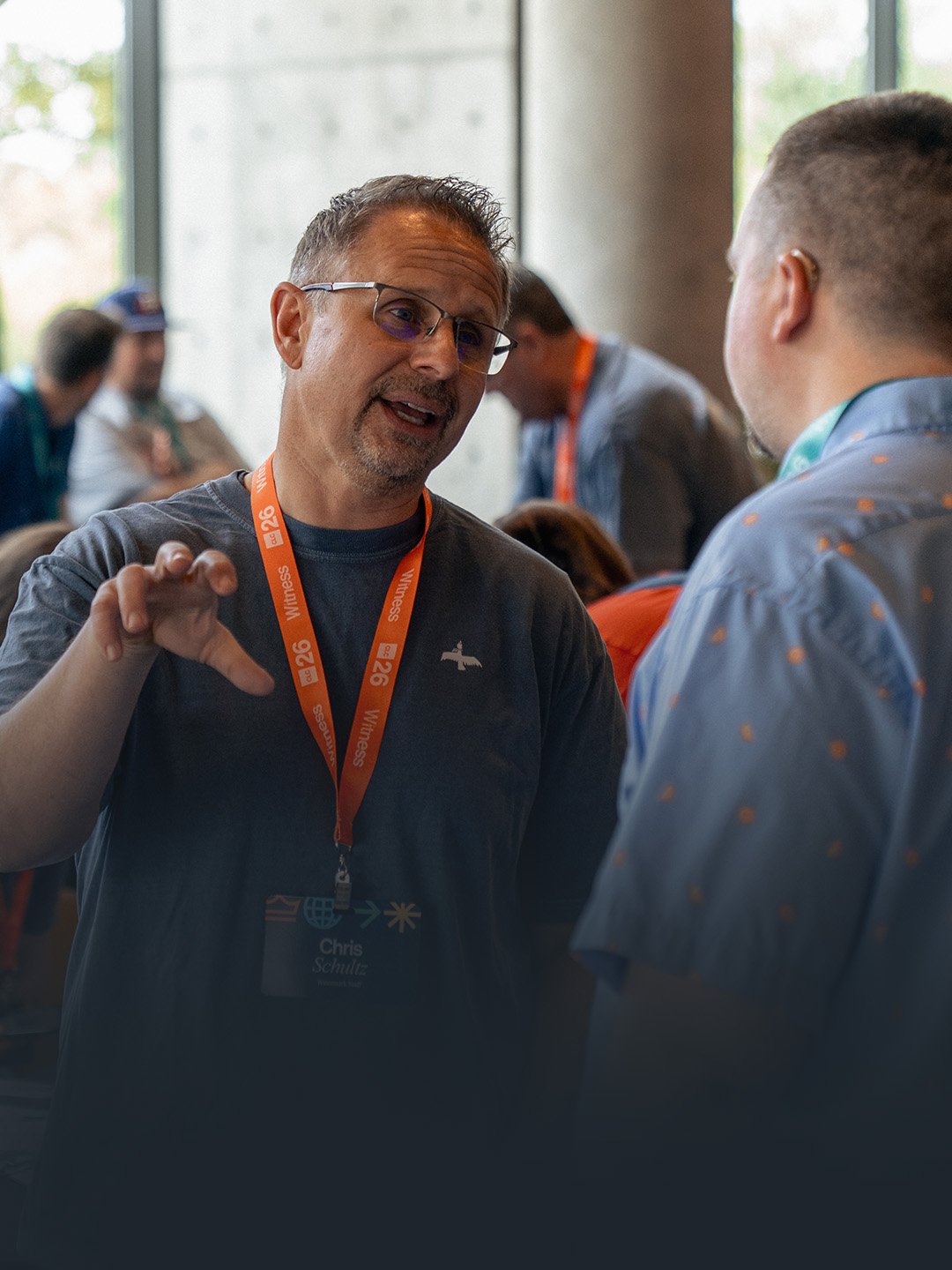 Watermark staff talking with a Church Leaders Conference attendee