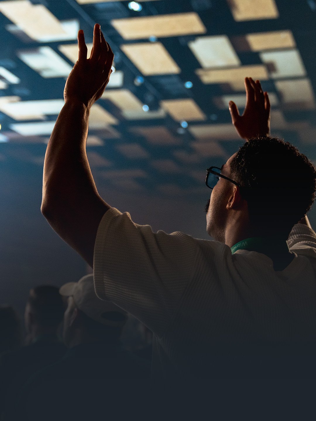 Man worshiping at Watermark Community Church