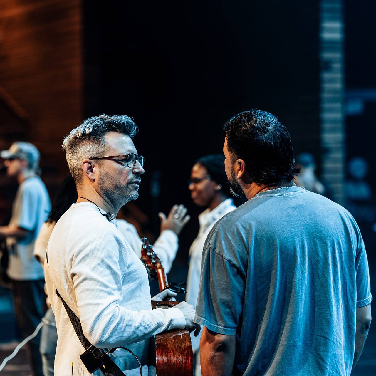 Worship Pastor, Jon Abel, talking with a CLC conference attendee