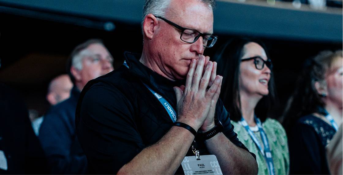 Church Leaders Conference attendee praying
