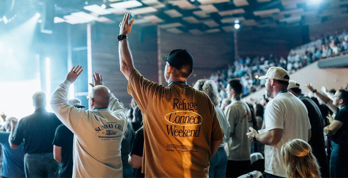 Church Leaders Conference male attendee worshiping
